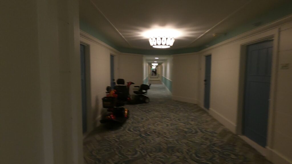 Scooters parks in hallway of guest rooms at Disney