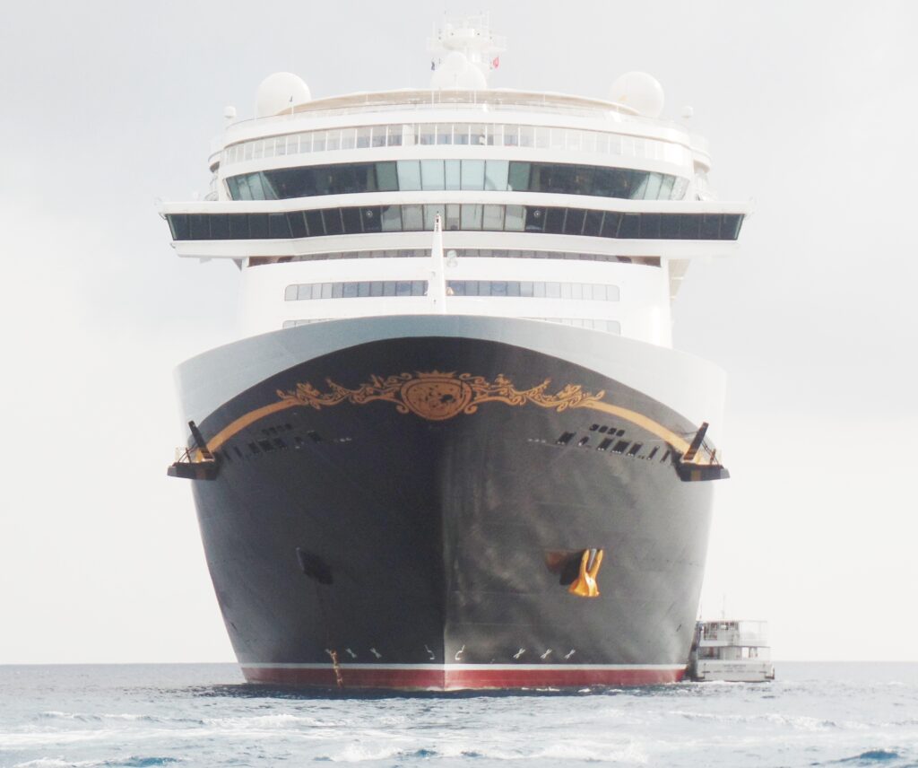 Tender Boat Beside Disney Cruise Ship