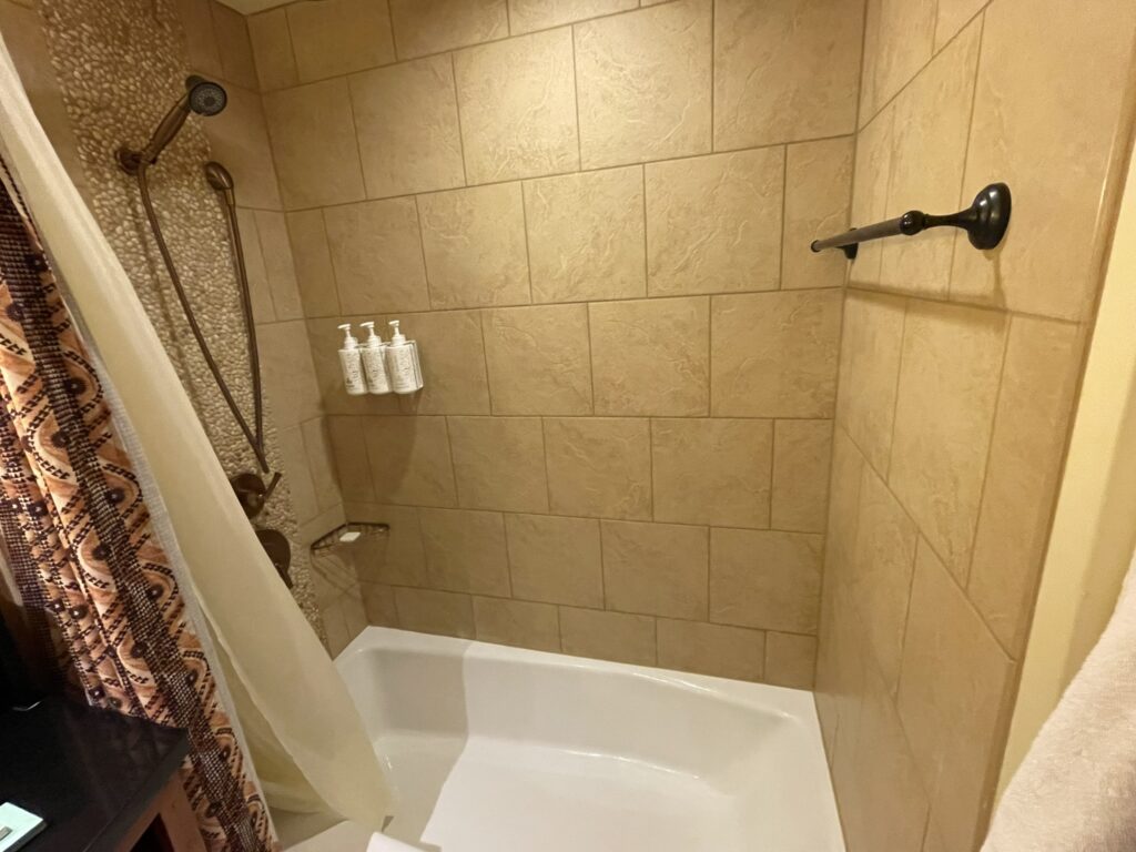 Studio Bath and Shower combination at Aulani